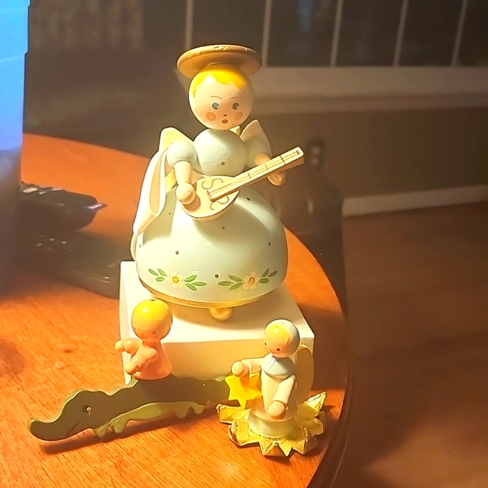 Vintage wooden angel music box and 2 wooden figures.